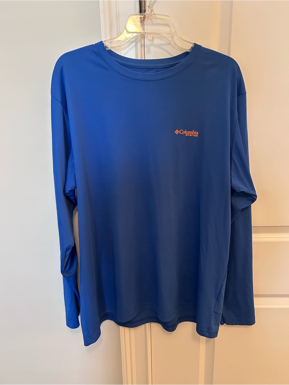 Men’s Columbia Blue Long Sleeve Performance Shirt with Orange Logo